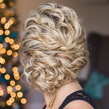 Garnier Fructis Curl Shaping Spray Gel - Curly Updo Hairstyle Gallery - Learn how to style Vintage Curly Updo - add more texture to curls by twisting and pinning sections